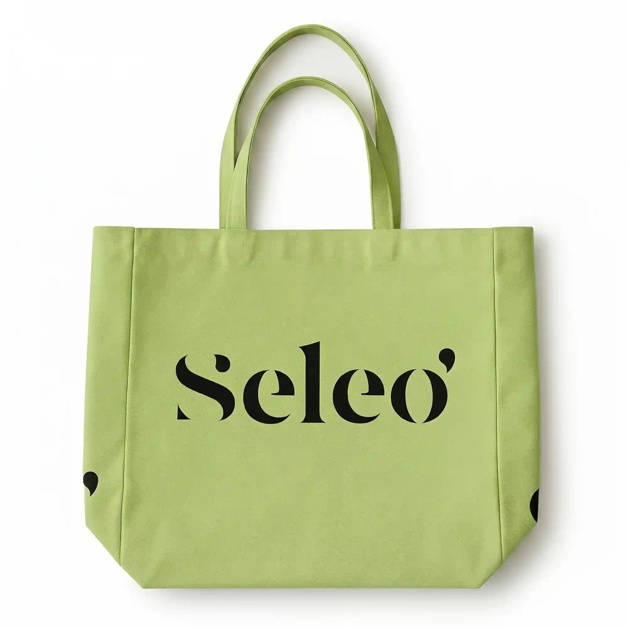 Seleo premium sage green canvas tote bag, stylish and reusable shopping bag for an eco-friendly lifestyle in Kuwait, UAE and Saudi. 
حقيبة تسوق قماشية "توت باج" من سيلو (Seleo) باللون الأخضر الهادئ، مصممة بأناقة كحقيبة تسوق مستدامة وصديقة للبيئة في الكويت.
